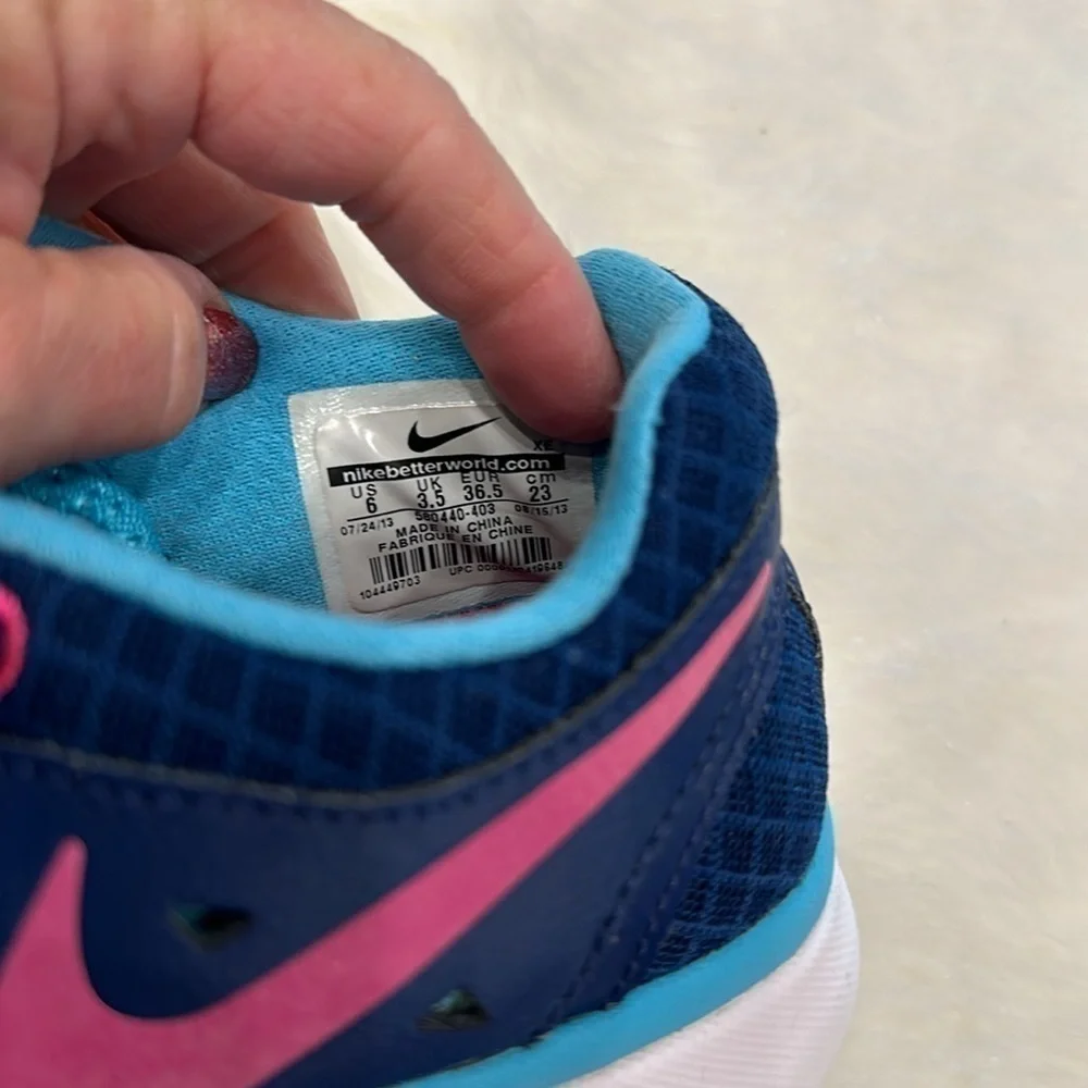 Nike tennis shoe dark blue light blue pink swish size 6